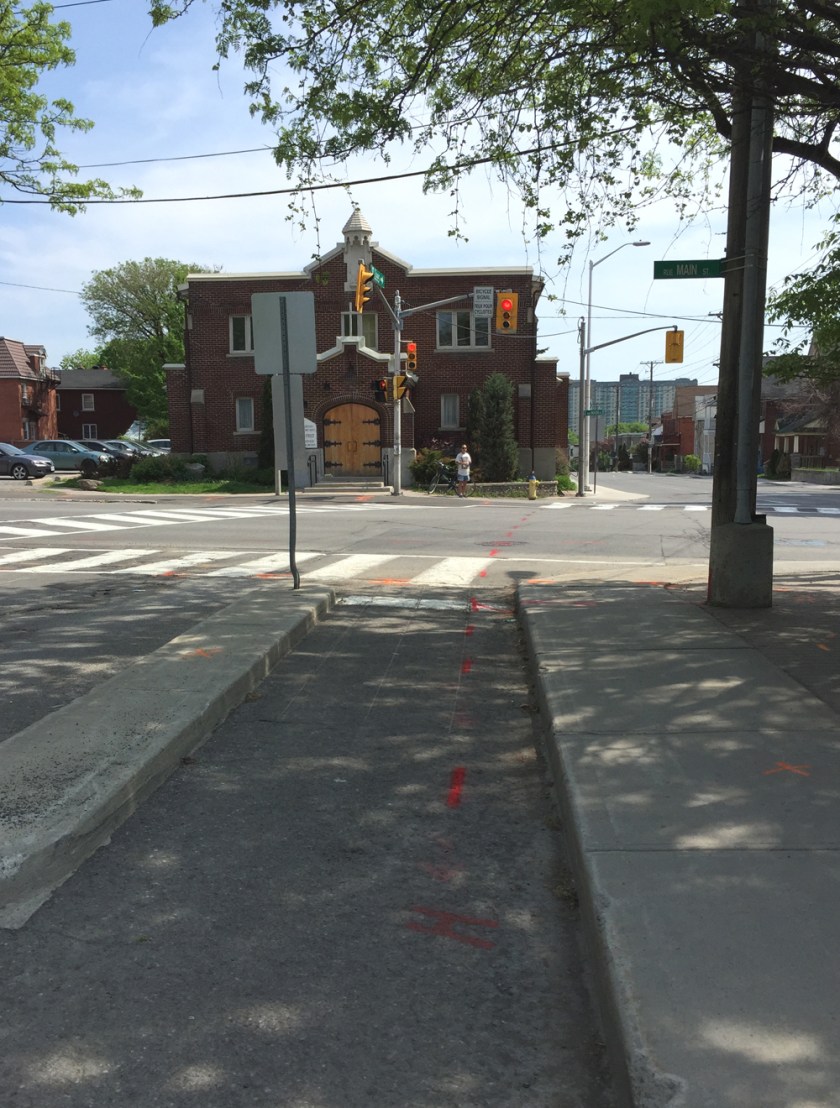 End of east bound bike lane along Graham, looking across Main St to Lees Ave