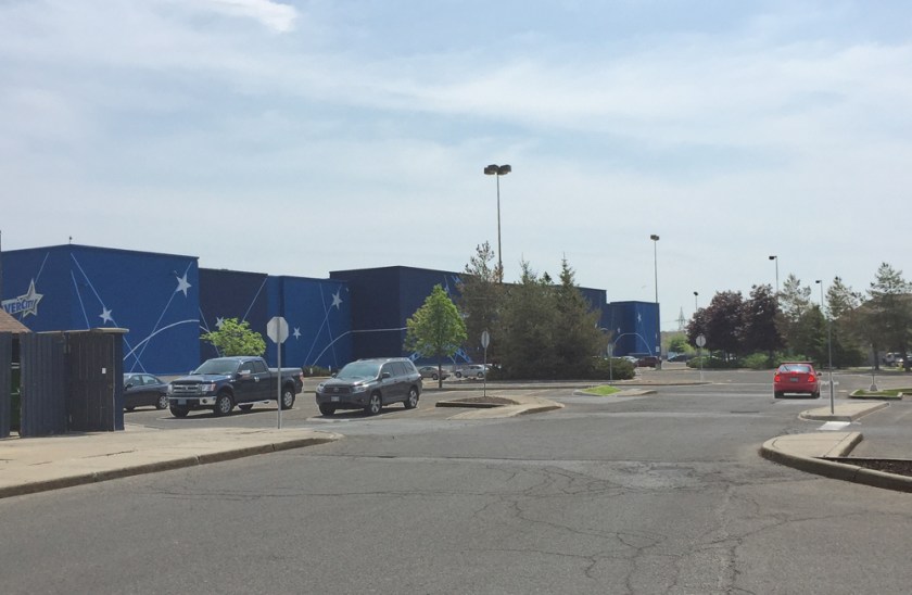 Through the mall parking, round back behind the giant cinema