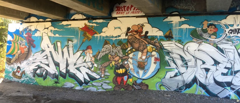 Graffiti under highway 5 to 50 interchanges along Ruisseau de la brasserie